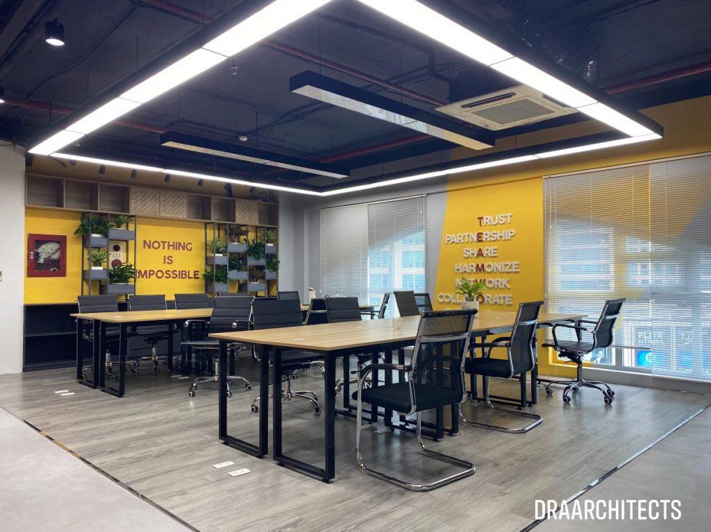 hinh ban van phong va trong nha d28aff01 - Mẫu văn phòng đẹp có tông màu vàng tươi sáng cùng nhiều mảng xanh