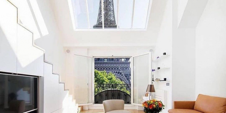 ve gia chi can mot can nha nho ben thap 34111980 - Căn nhà nhỏ bên tháp Eiffel